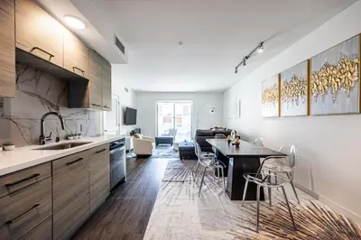 a kitchen with a table and chairs in a room at 3BR Apartment Near Santa Monica Pier in Los Angeles