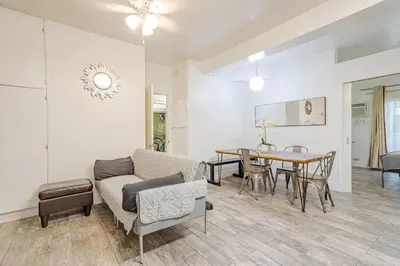 a living room with a couch and a table at Westwood UCLA 2BR, 1BA Cozy Condo w Amenities in Los Angeles
