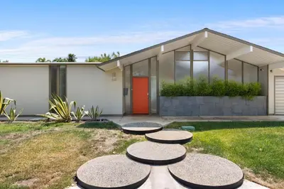 a house with three picnic tables in front of it at Eichler Mid-Century Perfect WFH, Relax and Entertain in Orange