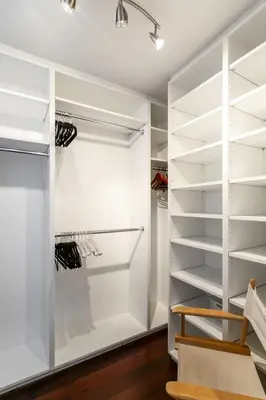 a walk in closet with white shelving at Hollywood Dell Oasis, Canyon VIEWS, Fire Pit and BBQ in Los Angeles
