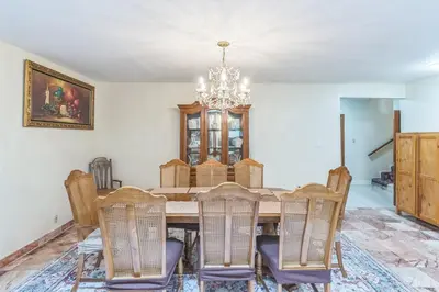 a dining room with a table and chairs at Russell House Near Hollywood & Griffith Park home in Los Angeles