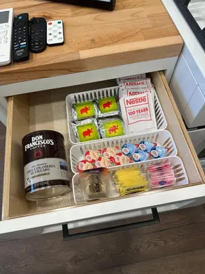 a drawer with food and other items in a cabinet at LA Coastal Oasis in Rancho Palos Verdes