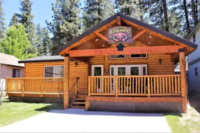 a large log cabin with a large deck at Fire Pit & Steps to Village- Village Hideaway in Big Bear Lake