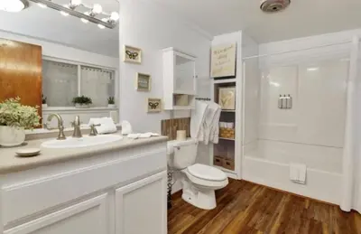 a bathroom with a toilet and a sink and a tub at Moab Cozy Lane HotTub & Game Room with Pool Table in Big Bear Lake