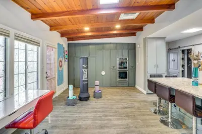 a room with a museum with a statue in it at 2 Mi to Cal State Long Beach Bungalow with Hot Tub! in Long Beach