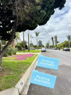 a street with parking available signs in a park at New Renovated 3B2B house in West Covina