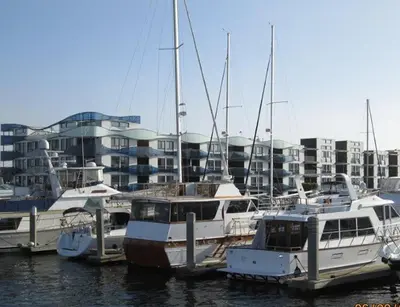 a group of boats docked at a marina with buildings at Prime Stays - Suite Elegance by MDR Marina & Venice - Pool, Hot Tub, Gym in Los Angeles