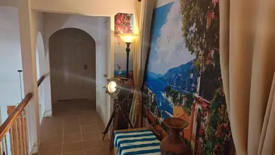 a hallway with a hallway at Golden House in Santa Clarita