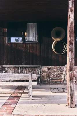 a wooden building with a bench and a window at Malibu ranch retreat in Malibu