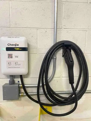 a black hose is hooked up to a charger at Studio City Chic Large Contemporary Condo in Los Angeles