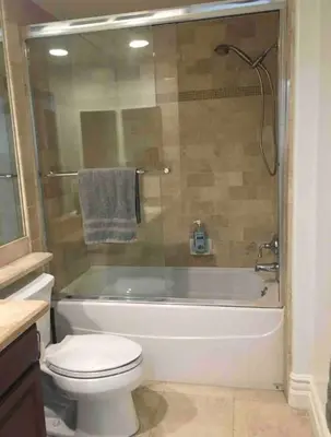 a bathroom with a tub and a toilet and a sink at Studio City Chic Large Contemporary Condo in Los Angeles