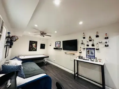 a room with a ping pong table and a pool table at Echo House in Los Angeles