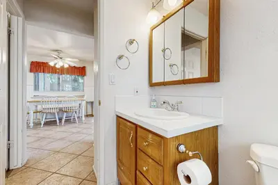 a bathroom with a sink and a mirror at Bright Moon in Lake Arrowhead