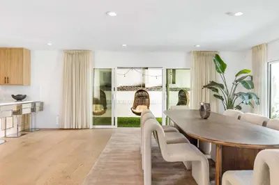 a kitchen and dining room with a table and chairs at Villa Incanto in Los Angeles