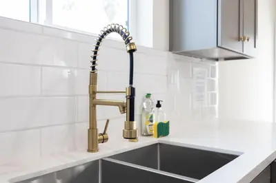 a kitchen sink with a kitchen faucet at Contemporary Retreat Hollywood & DTLA in Los Angeles