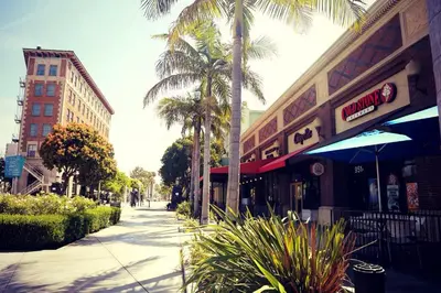 a city street with palm trees and a building at Renovated Culver City Escape Walkable WFH in Los Angeles