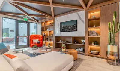 a living room with a white couch and a cactus at Modern 1BR Apartment with Pool, Hot Tub and Gym Access 10mins to Universal Studios in Los Angeles