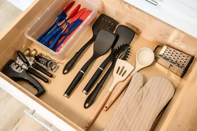 a drawer filled with utensils in a kitchen at 1 Block to Beach Heaven Chic 2BD in Manhattan Beach