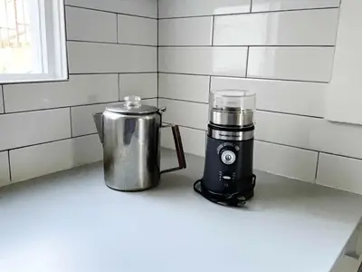 a food processor and a blender sitting on a counter at Montecito Heights Hideaway in Los Angeles