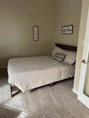 a bedroom with a bed in a room at Stylish Silver Falls 4BR KING Master Game Room in Bakersfield