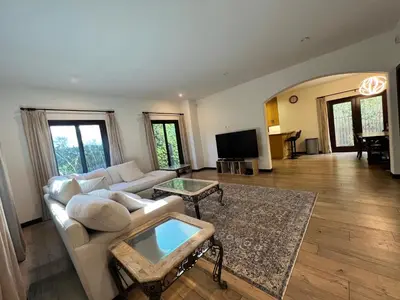 a living room with a couch and a table at Beachwood in Los Angeles