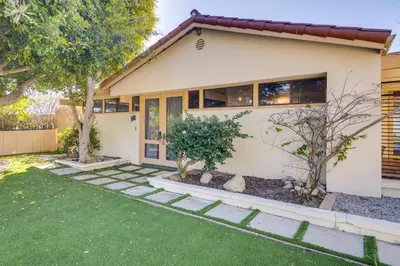 a house with trees in front of it at Stroll to Beach and Pepperdine Airy Malibu Studio in Malibu