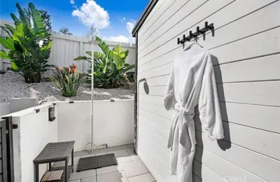 a robe hanging on the side of a house at Wellness Villa Resort in Abbeyville