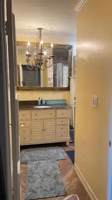 a bathroom with a sink and a mirror at Glamping Cabin Tent Heated View Deck 2Acre Estate - Female Share Indoor - Men Share Outdoor - RG in Encino