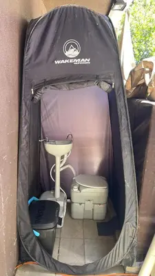 a tent with a sink and a toilet in it at Glamping Cabin Tent Heated View Deck 2Acre Estate - Female Share Indoor - Men Share Outdoor - RG in Encino