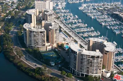 an aerial view of a marina with many tall buildings at A Stunning Luxury Resort-Style Furnished Condominium Plus All Inclusive Amenities! in Los Angeles