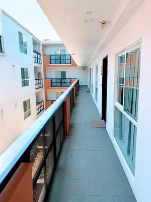 an empty hallway of an apartment building at Western Romaine in Los Angeles