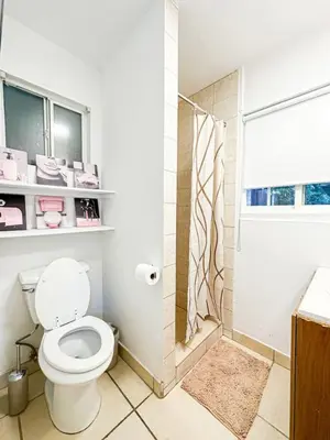 a bathroom with a toilet and a shower at Relaxed and Cozy Poolside Studio - LOU2 - BUR in Burbank