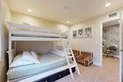 a bedroom with two bunk beds in a room at On the Doorstep in Anaheim