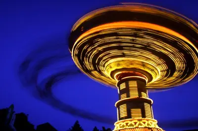 a pole with a swirl of light on it at Mickey's Corner in Anaheim