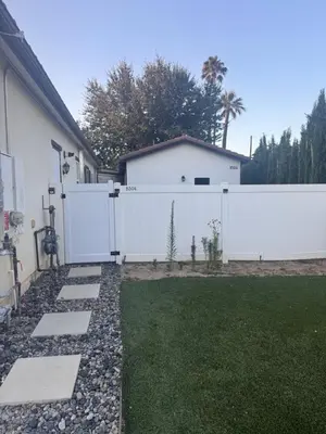 a white fence in front of a house at Stunning Guest House in West Hills California in Hughes-Canoga Park Heliport