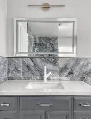 a bathroom with a sink and a mirror at The Luxe Escape | Near LAX & West LA Hotspots in Los Angeles