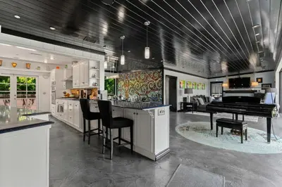 a kitchen with a table and a piano in it at New Listing Burbank Bungalow by Colby&Conrad in Los Angeles