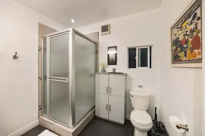 a bathroom with a shower stall and a toilet at New Listing Burbank Bungalow by Colby&Conrad in Los Angeles