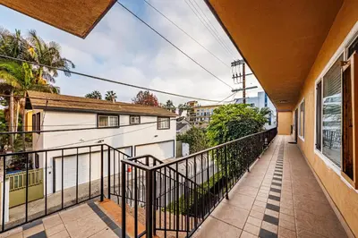 a balcony of a house with a fence at Amazing Berryman 1bd#8 in Los Angeles