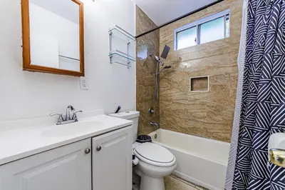a bathroom with a toilet and a sink and a shower at Amazing Berryman 1bd#8 in Los Angeles