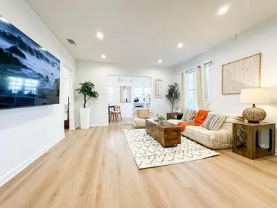 a living room with a couch and a table at Cozy Boho 2BR Near Beverly Hills - DOH2 - CUL in Los Angeles