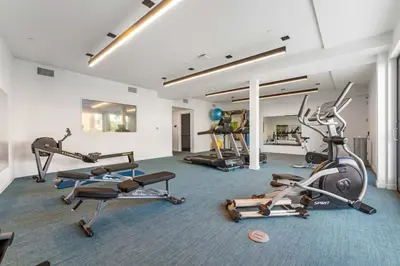a gym with several exercise bikes in a room at Arts District Stay, Walk to Little Tokyo with Parking in Los Angeles