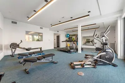 a gym with several exercise bikes in a room at Arts District Condo, Walk to Little Tokyo Plaza in Los Angeles