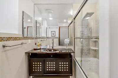 a bathroom with a sink and a shower at Quiet Home with Spectacular Scenic Mountain Views near Universal Studios Hollywood in Los Angeles