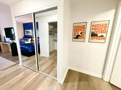 a mirror in a room with a bedroom at 3BR Retreat in Prime Valley Location 109 in Encino