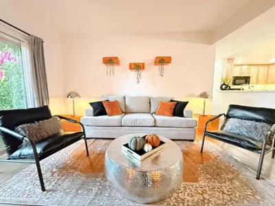a living room with a couch and a table at 3BR Retreat in Prime Valley Location 109 in Encino