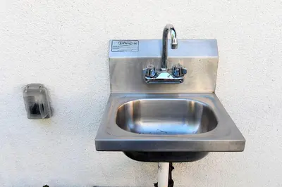 a stainless steel sink in a wall at Urban Oasis in Los Angeles