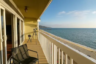 a view of the ocean from the balcony of a house at Ocean Haven Beachfront Getaway by Redondo Pier in Redondo Beach