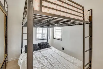 a bedroom with a bunk bed in a room at Fullerton Home Base Easy Access to Dtwn and CSUF! in Fullerton
