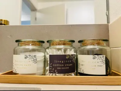 three jars on a shelf with labels on them at Chic Hollywood Dream Large Studio in Los Angeles